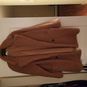 Heavy brown sweater coat that button closes